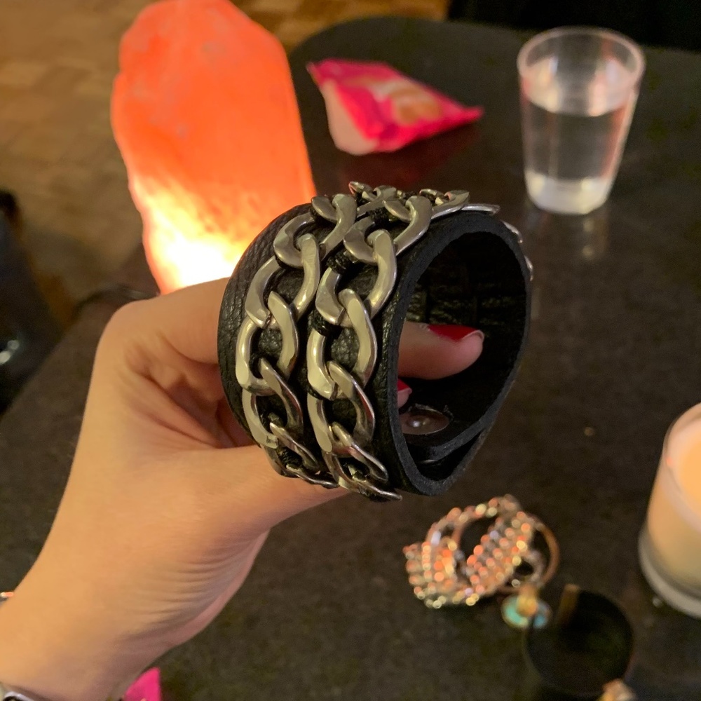 Bracelet with silver detail over leather band